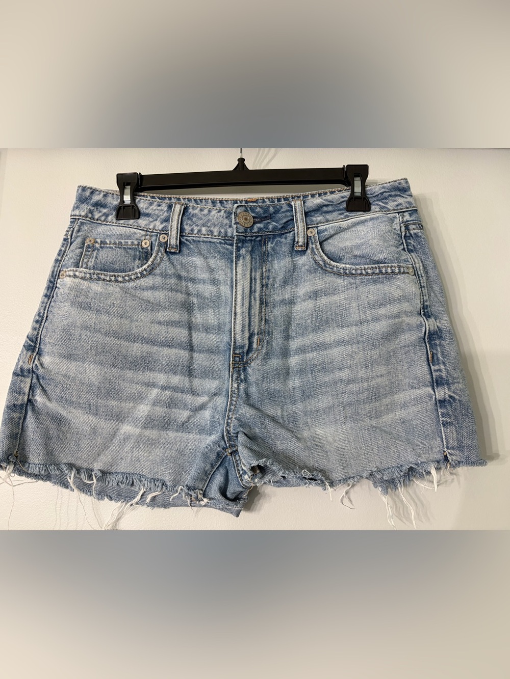 American Eagle Outfitters light blue denim shorts with button detail